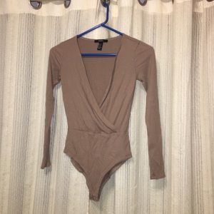 Tan low-cut long-sleeved body suit